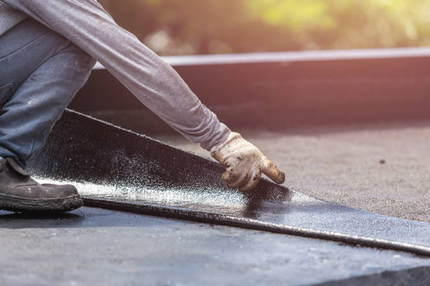 Professional Basement Waterproofing technician working in Richland, WA
